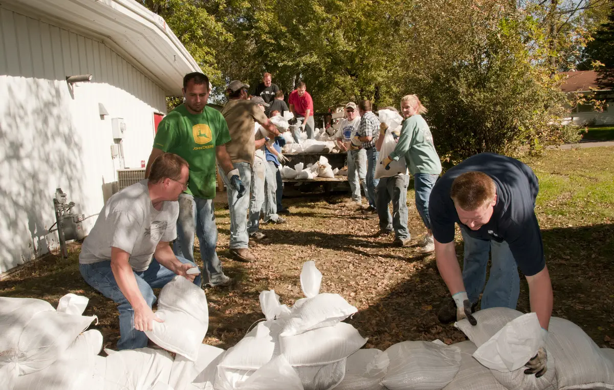 Volunteers helping with flood cleanup in Lancaster CA