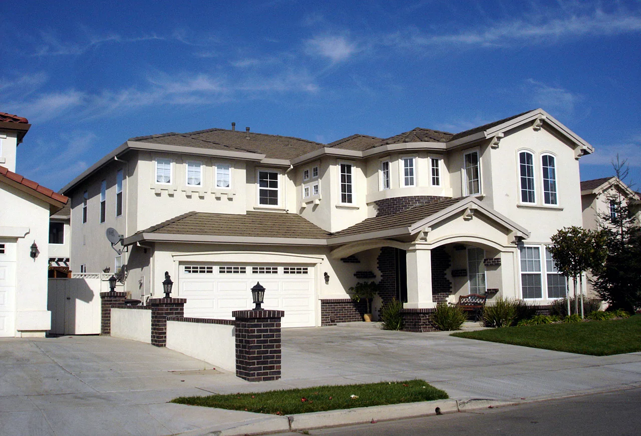 Large suburban California home on a quiet street, shown on the terms of use page